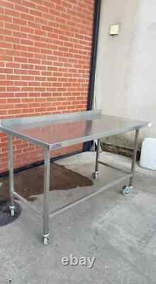 Commercial Stainless Steel Table/Work Bench On Braked Castors (1400mm x 690mm)