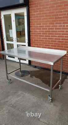 Commercial Stainless Steel Table/Work Bench On Braked Castors (1400mm x 690mm)