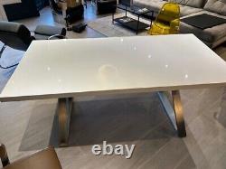 Dining table from Dwell. Stainless steel crossed legs. Seat 8 + Extreemely solid
