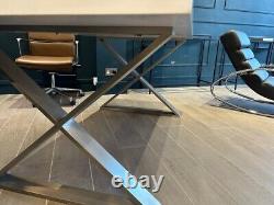 Dining table from Dwell. Stainless steel crossed legs. Seat 8 + Extreemely solid