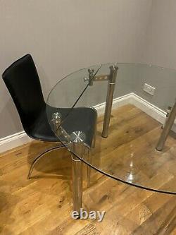 Extendable Round Or Rectangular glass dining table and 4 black chairs