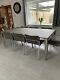 Gloster Extending Dining Table And 8 Stackable Chairs, Glass And Stainless Steel