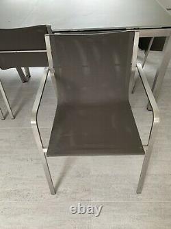 Gloster Extending Dining Table And 8 Stackable Chairs, Glass And Stainless Steel