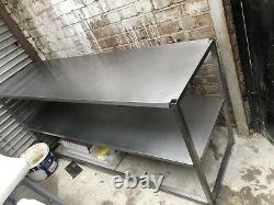 Metal table, Used Commercial Kitchen Equipment. Estimated To Be 2 Meters Long
