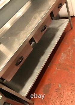 Stainless steel table with drawers