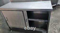 Stainless steel table with sliding drawers and splash back