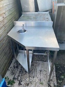 Stainless steel table with tap