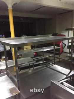 Stainless steel table/work bench with upstand on back