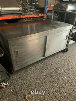 Used Stainless Steel Table With Sliding Doors N Wheels