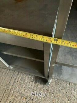 Used Stainless Steel Table With Sliding Doors N Wheels